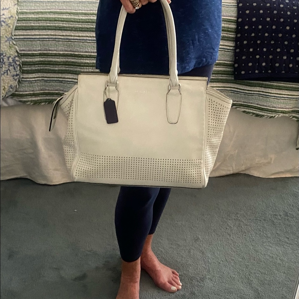 Coach Tote…. White leather- zipped closure with double strap handles